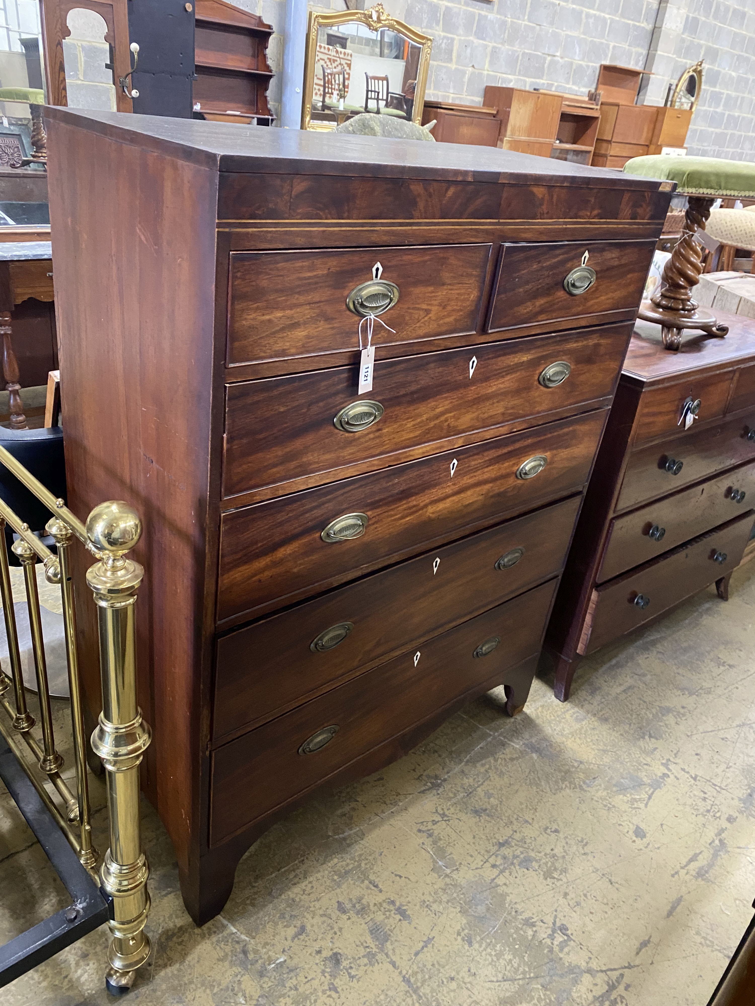 A George IV mahogany tall chest, width 107cm, depth 52cm, height 145cm